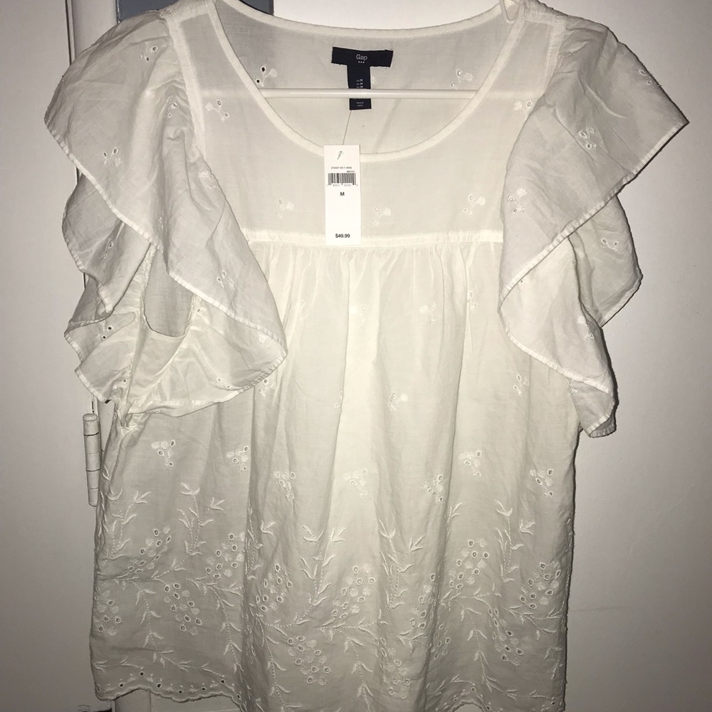 White flutter sleeve eyelet blouse